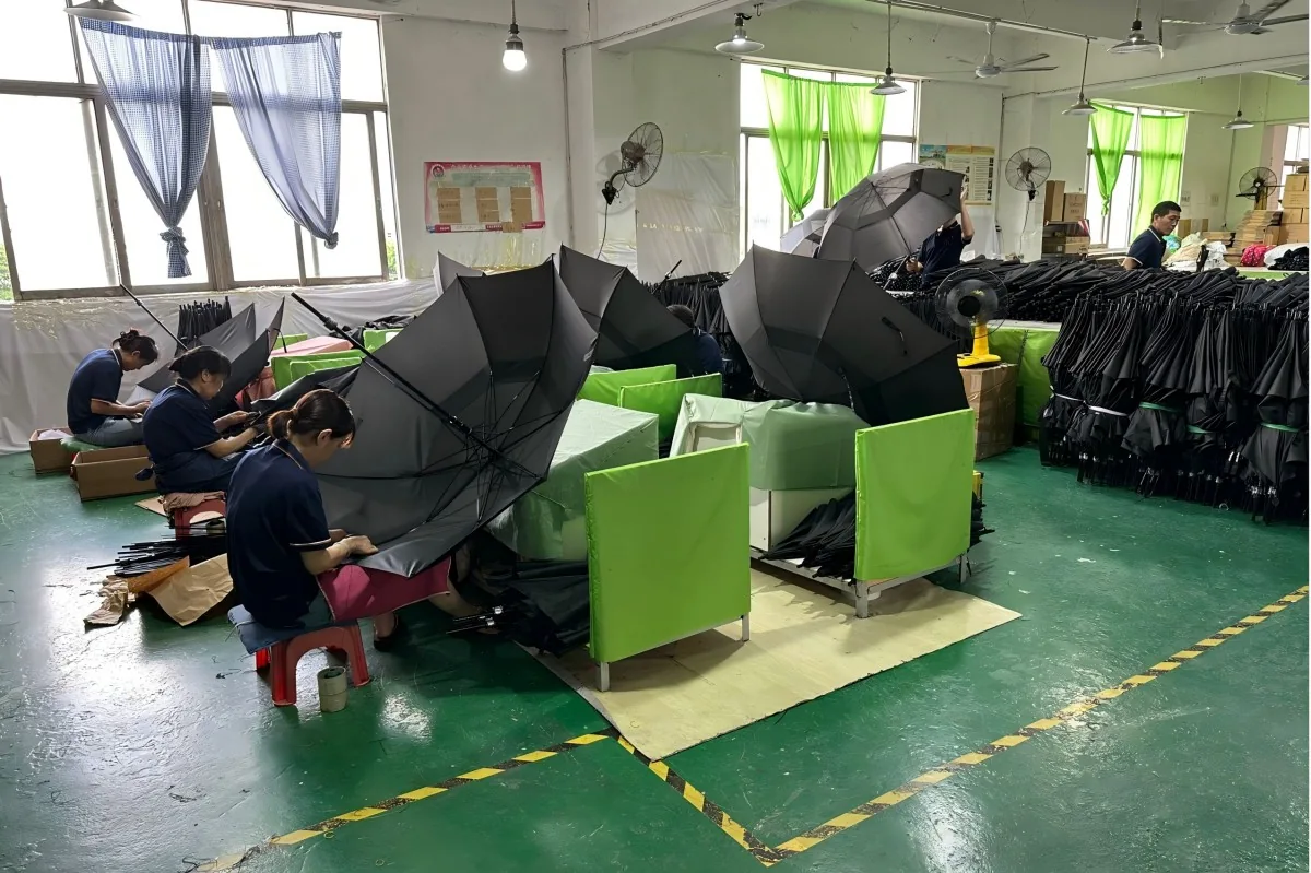 Umbrella canopy and frame assembly workstations — industry process reference